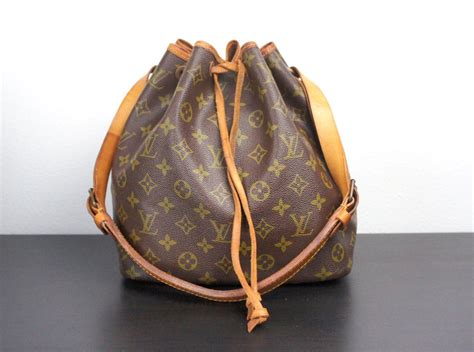 louis vuitton drawstring bag black|Louis Vuitton round bucket bag.